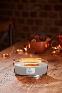 Ароматическая свеча с ароматом леса, пряной гвоздики и мускуса Woodwick Ellipse Sacred Smoke 453 г