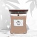 Ароматична свічка з ароматом айви, ірису та сандалу Woodwick Medium Cashmere 275г